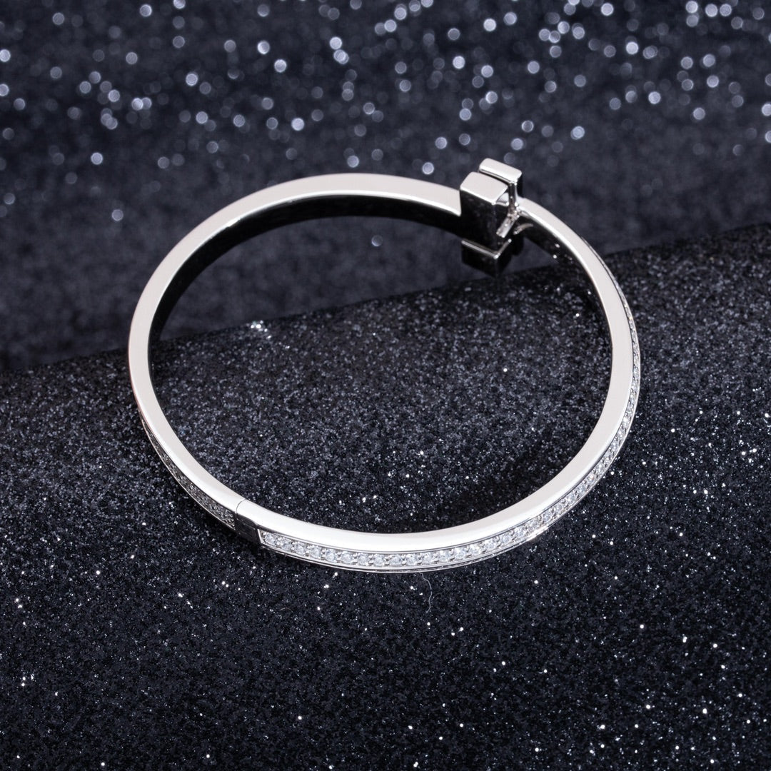 Tiffany Wide Cubic Zirconia Hinged Bangle Silver