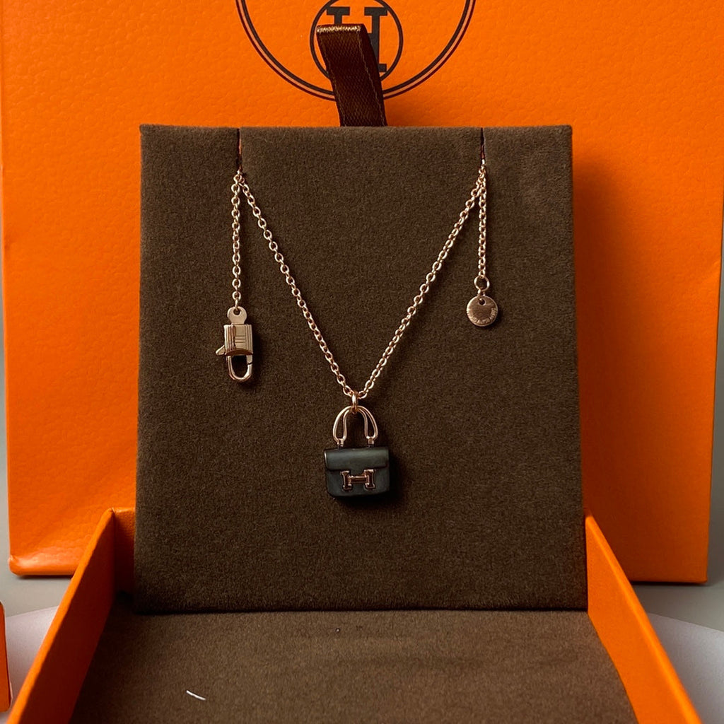 Hermes Constance Black Pendant Pink Gold Necklace