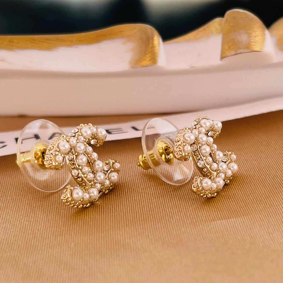 Chanel Double C MOP Gold Stud Earrings