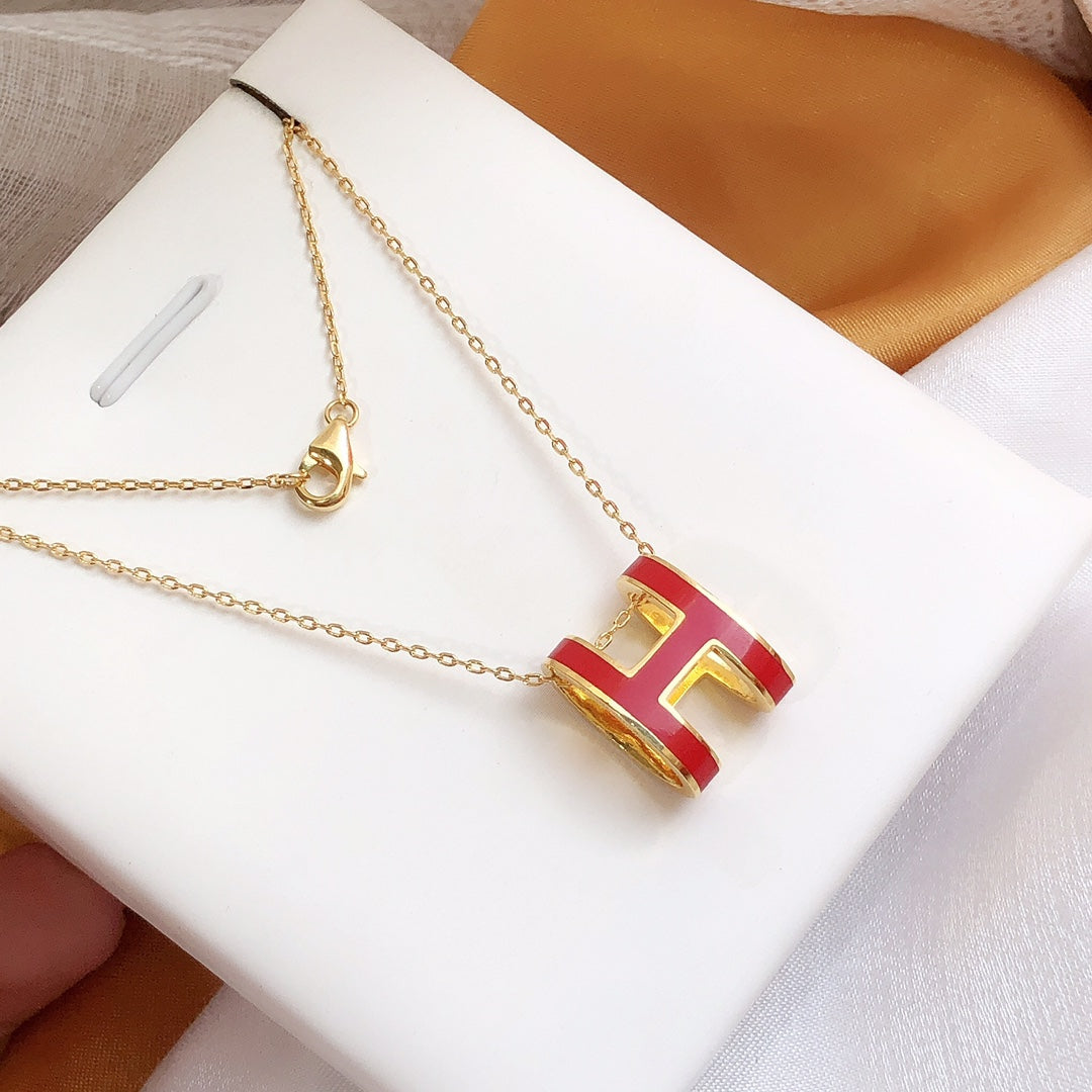 Hermes HM Clic Red Enamel Gold Necklace