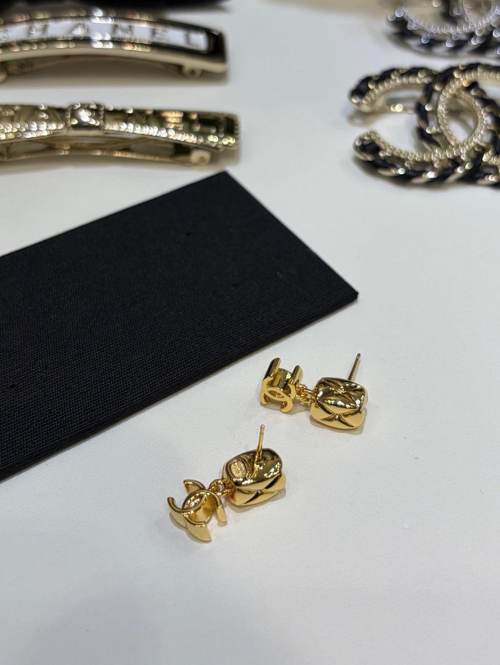 Chanel 2026 Gold Diamond Pattern Small Square Double C Pendant Earrings