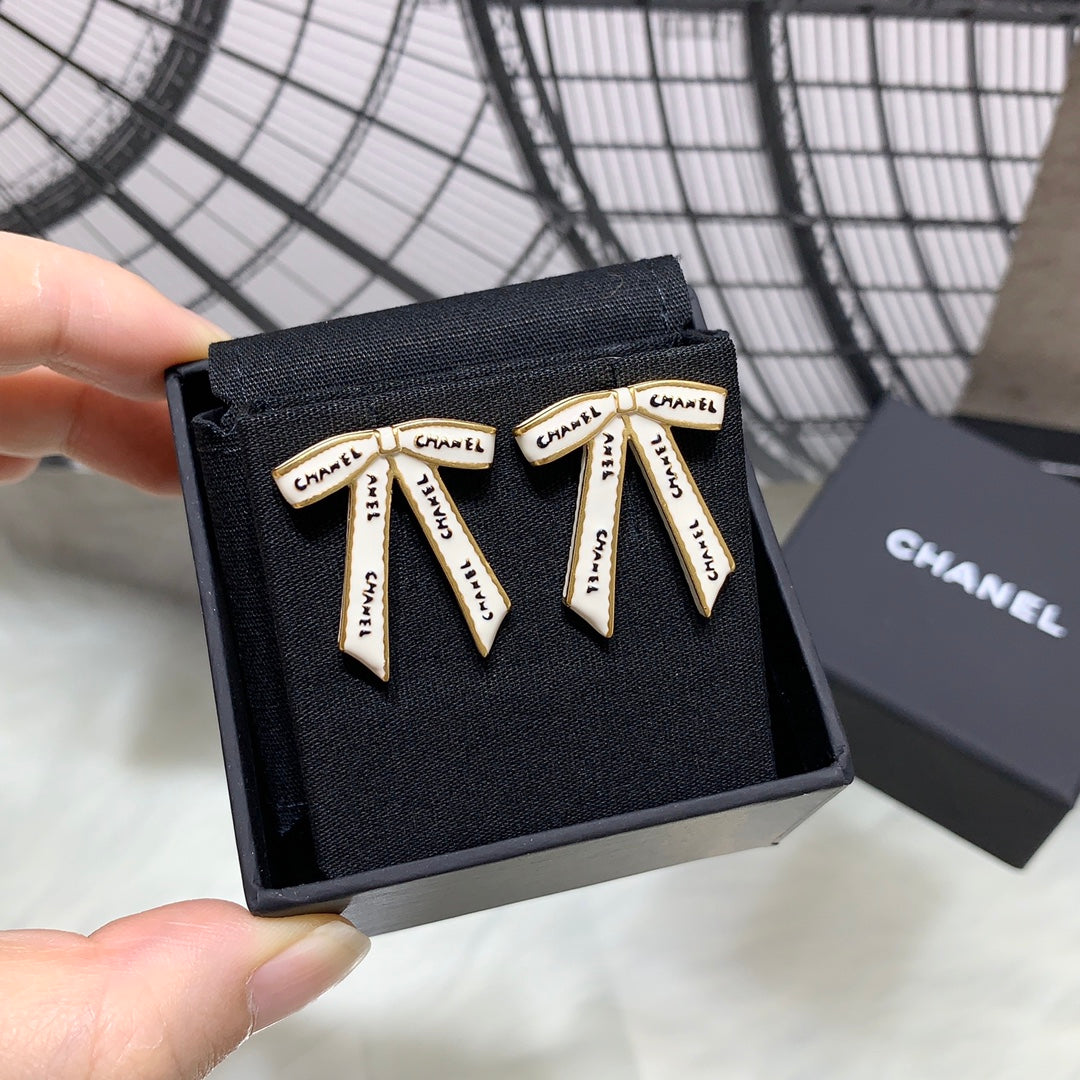 Chanel Black Letter Earrings with White Ribbon and Bow