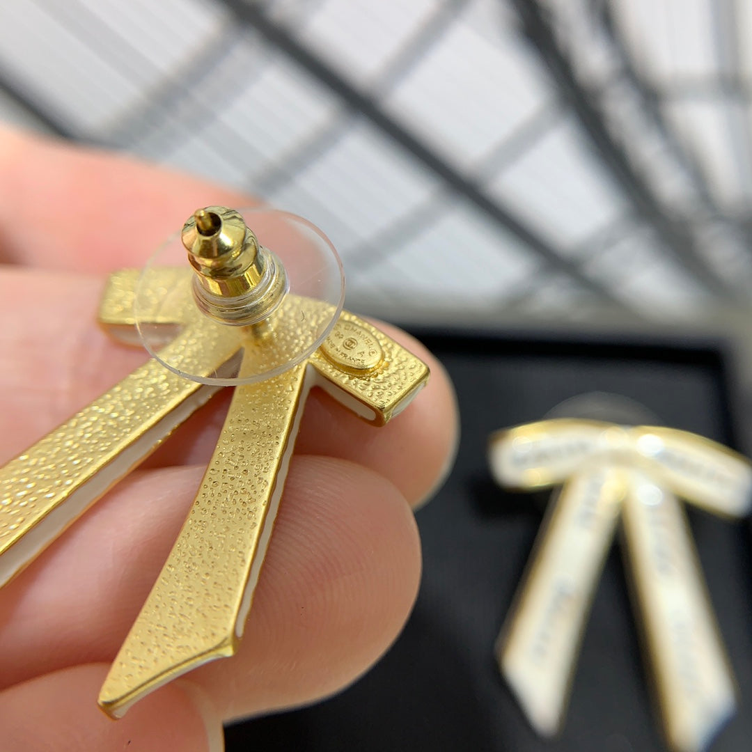 Chanel Black Letter Earrings with White Ribbon and Bow