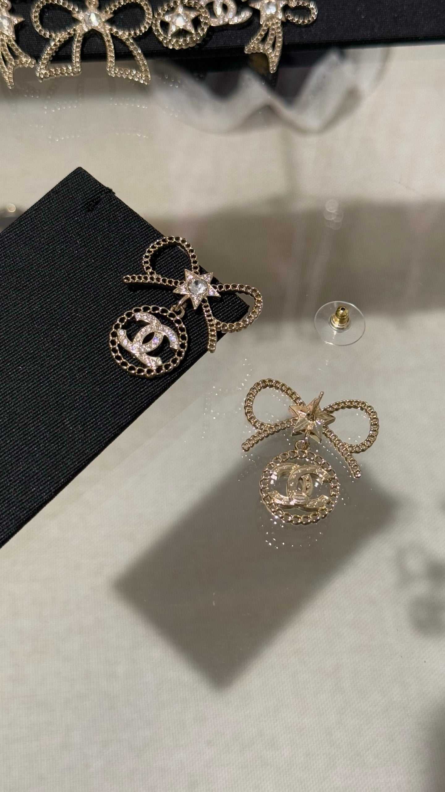 Chanel Light Gold Earrings with Bow Rhinestones and Stars
